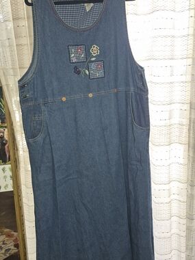 White Stag denim patchwork pinafore dress featuring floral appliqué embroidery.